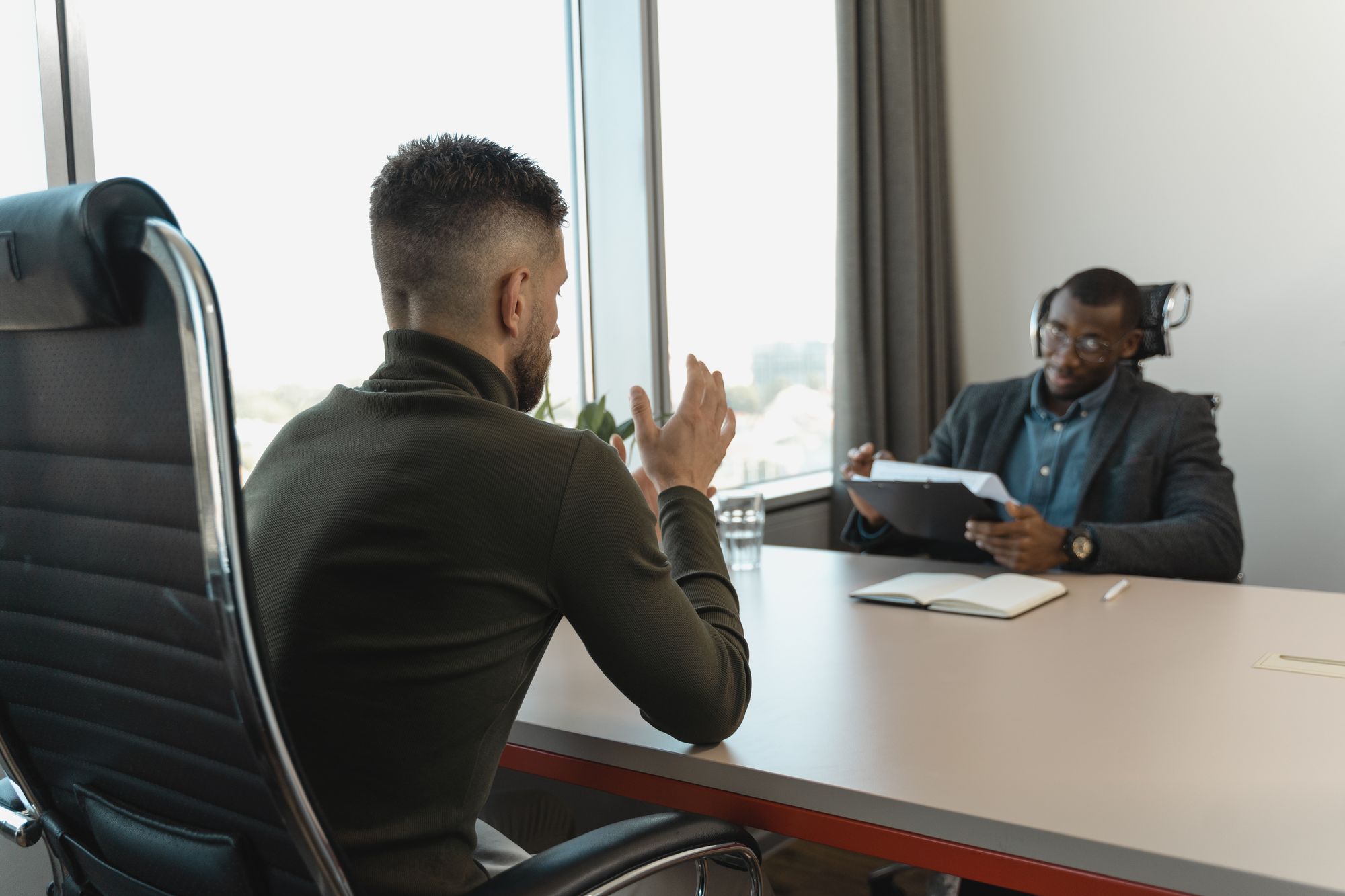 A practice manager interviewing a job candidate