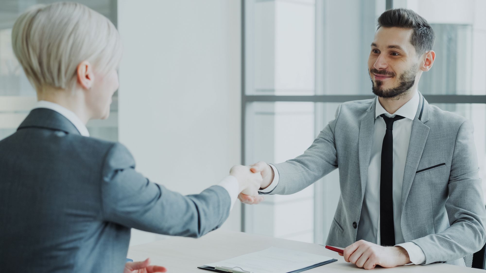 A new physician being welcomed to the practice